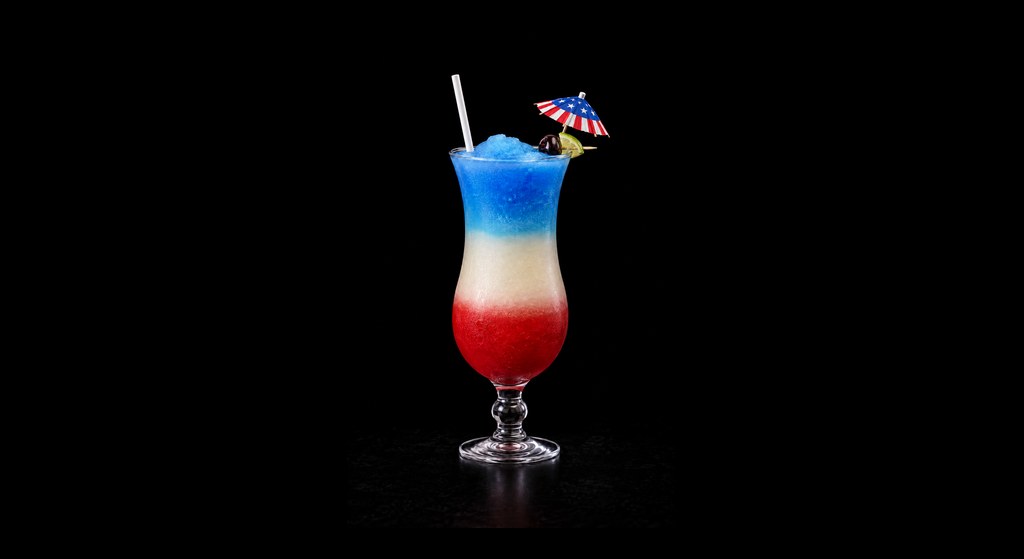 Fourth of July Margarita cocktail on a dark studio background