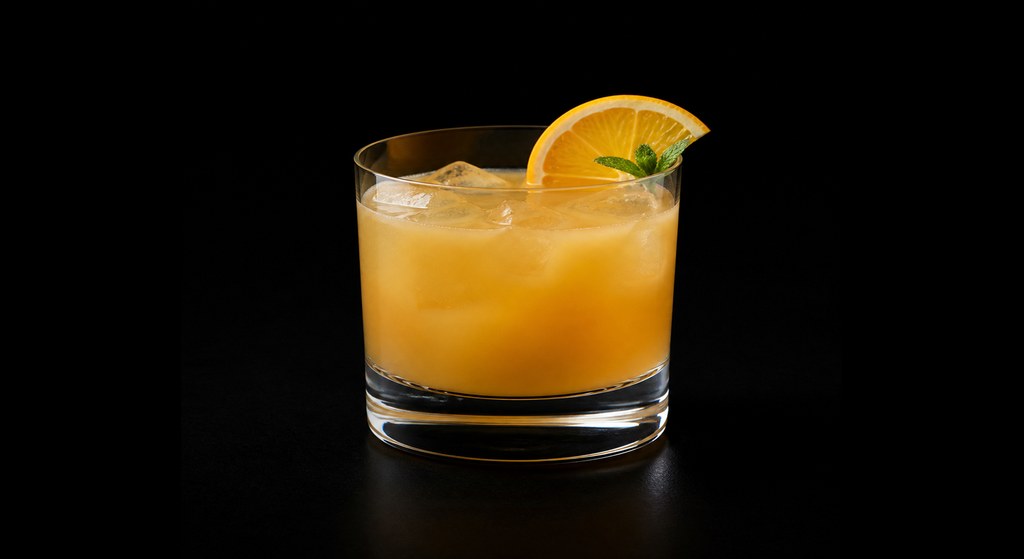 French Riviera cocktail on a dark studio background