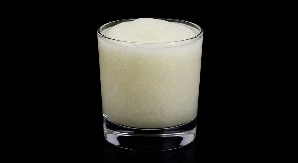 Frozen Apple cocktail on a dark studio background