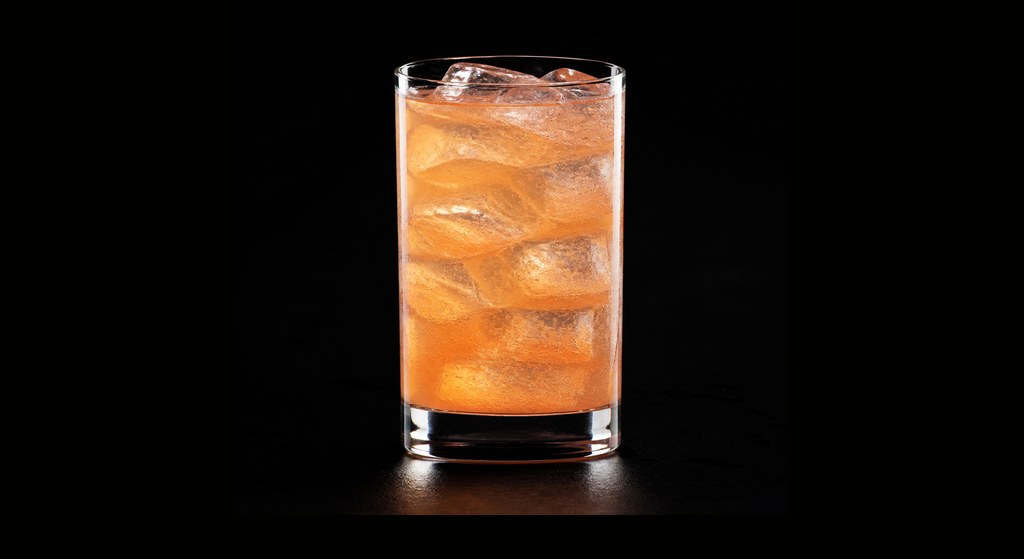 Georgia Peach cocktail on a dark studio background