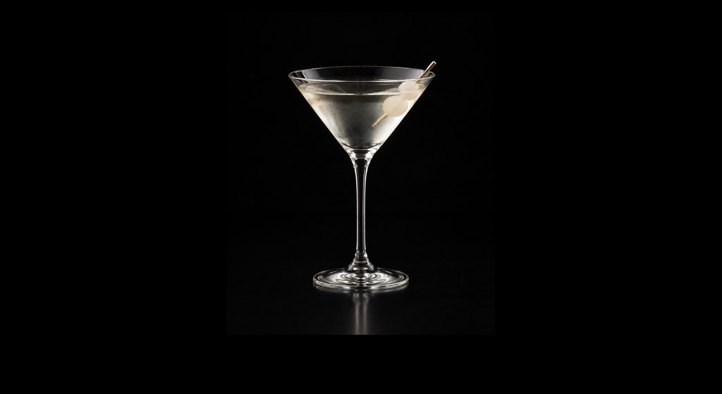 Gibson Dry Martini cocktail on a dark studio background