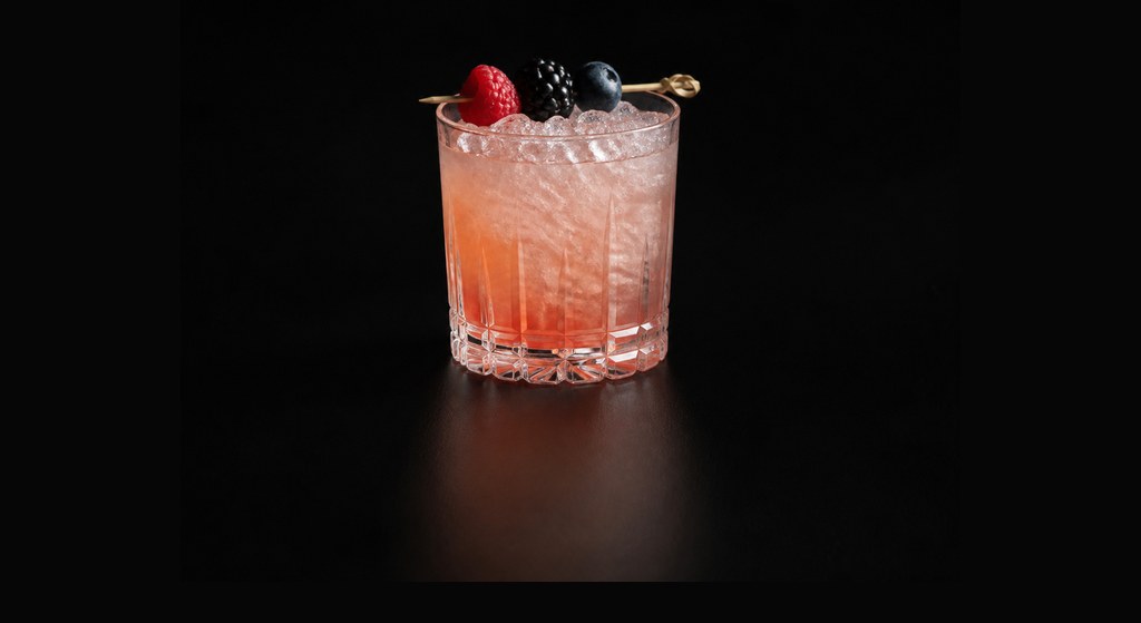 Gin Daisy cocktail on a dark studio background