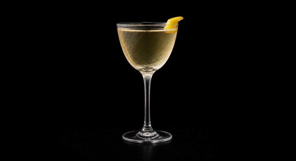 Gin Pahit cocktail on a dark studio background