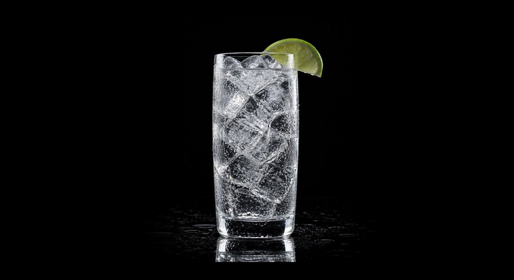 gin and tonic cocktail in a serving glass
