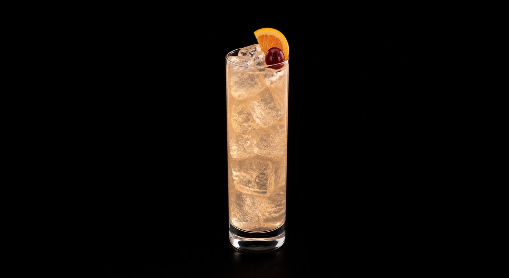 Glass Tower cocktail on a dark studio background