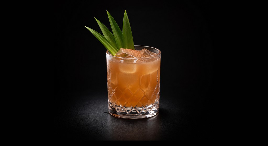 Good Enough Gatsby cocktail on a dark studio background