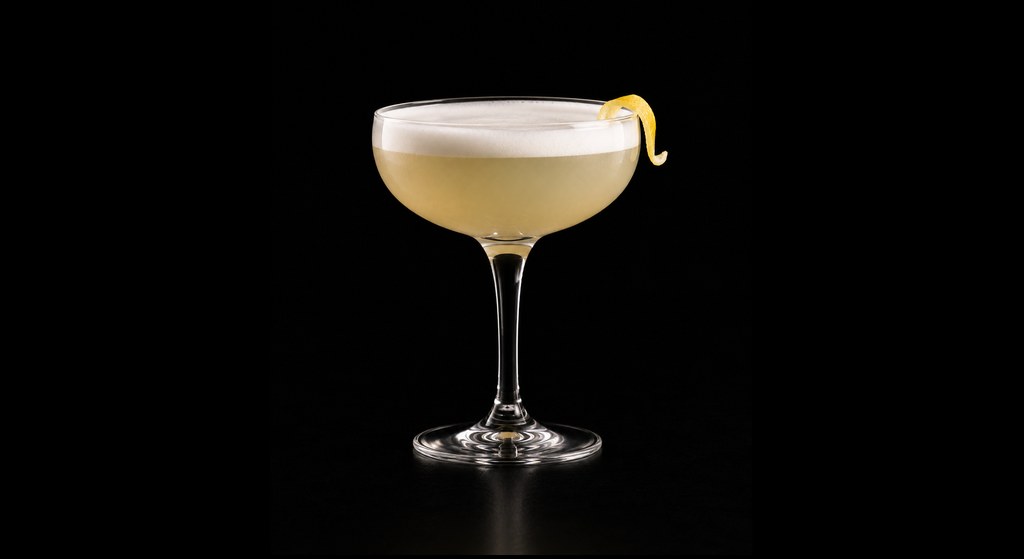 Gooseberry Sour cocktail on a dark studio background