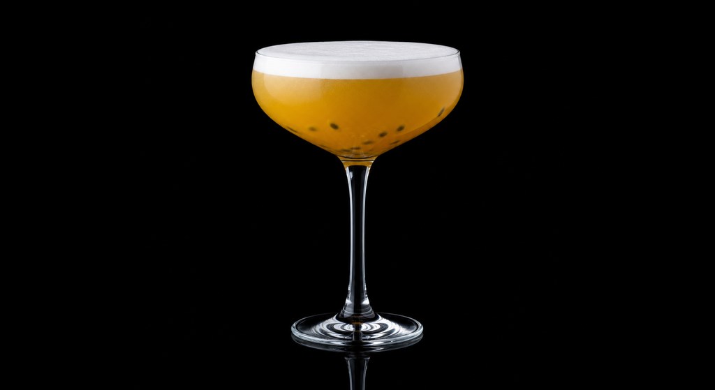 Grand Passion cocktail on a dark studio background