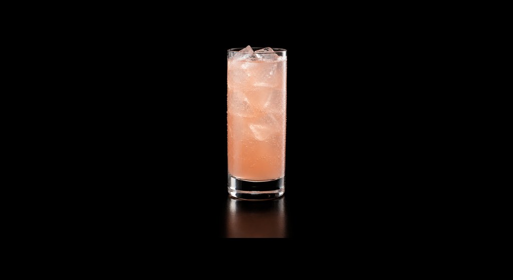 Grapefruit Rosemary Mocktail cocktail on a dark studio background