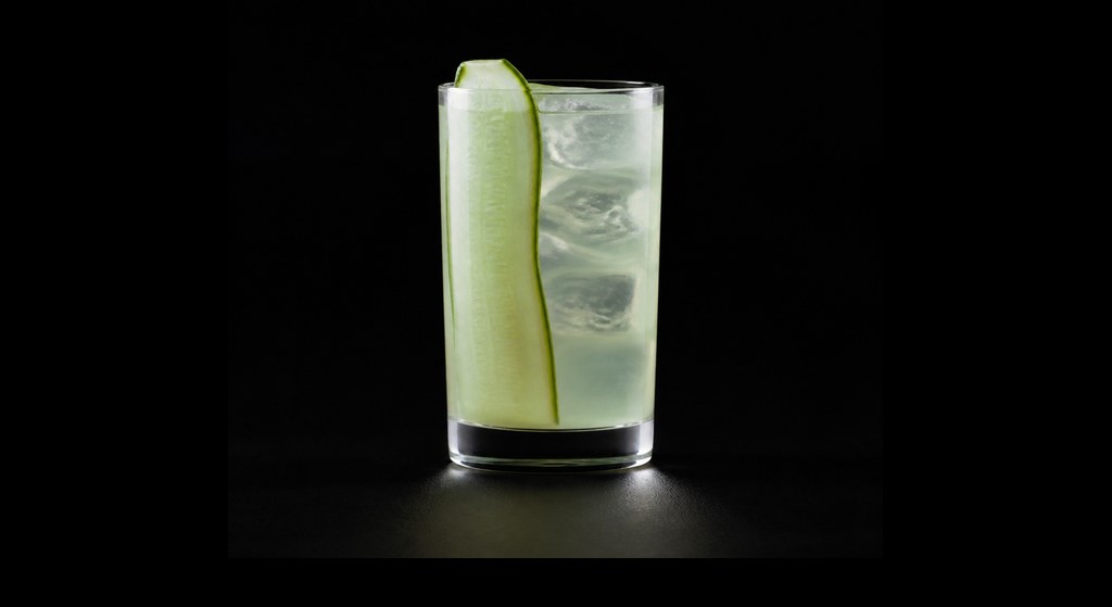 Green Beast cocktail on a dark studio background