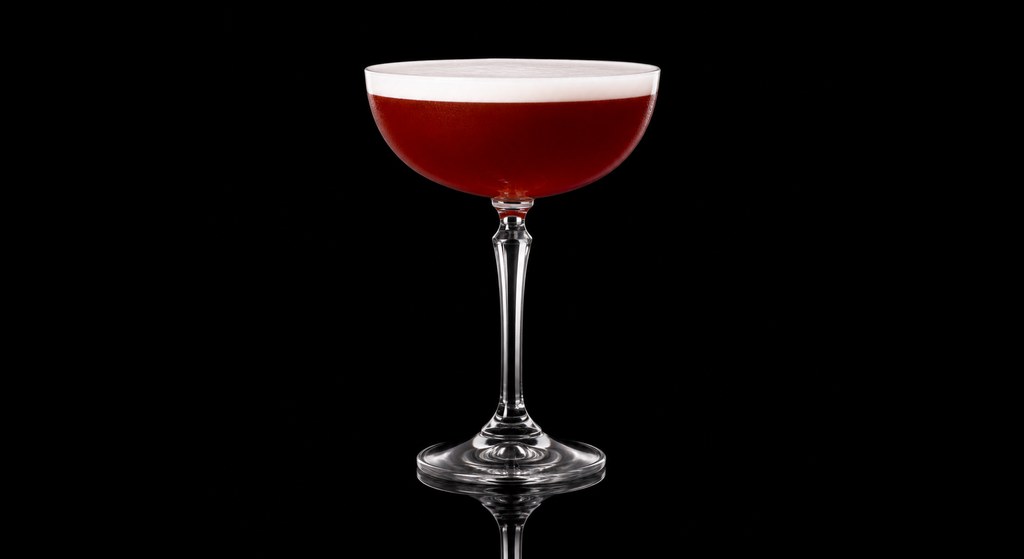 Greenwich Sour cocktail on a dark studio background