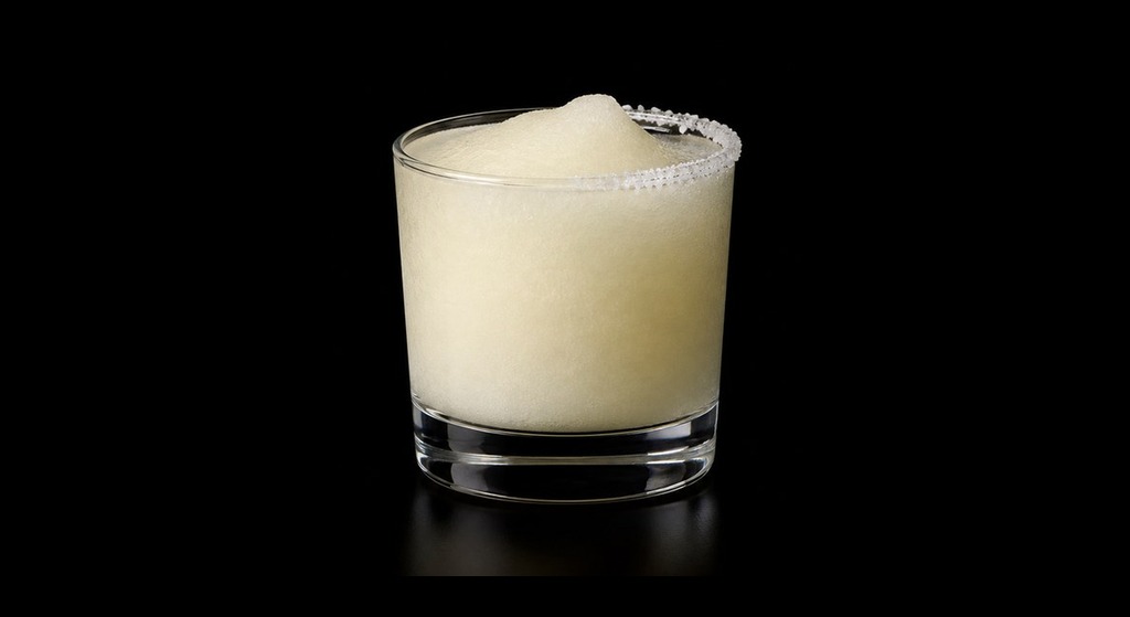 Haley Traub’s Frozen Margarita cocktail on a dark studio background
