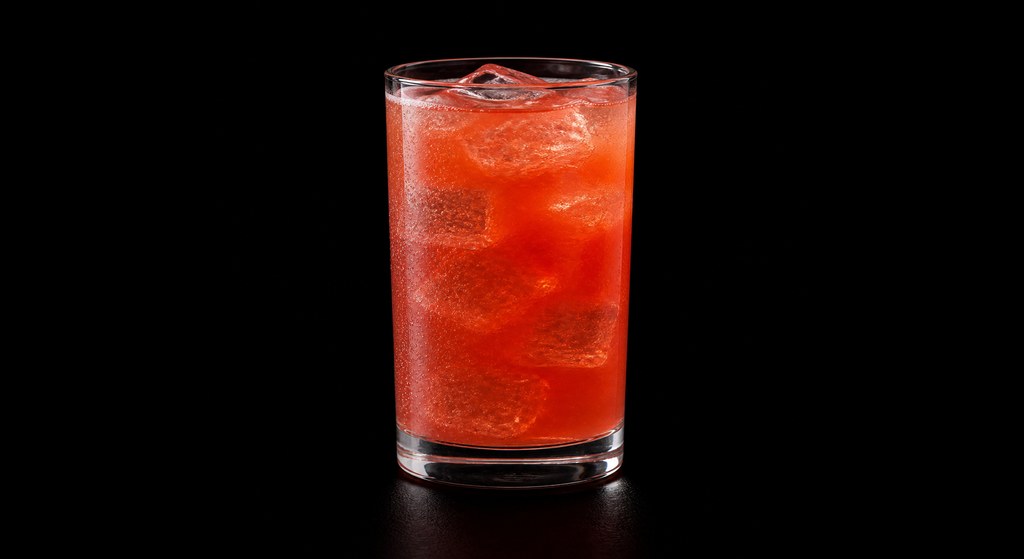 Harvest Nectar cocktail on a dark studio background