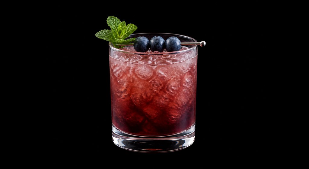 Harvest Smash cocktail on a dark studio background