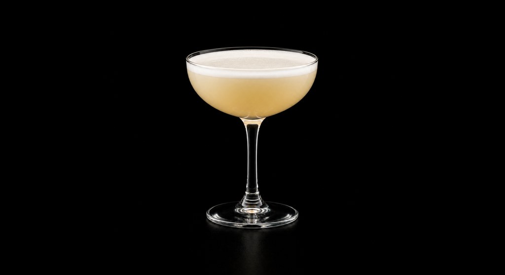 Harvest Sour cocktail on a dark studio background
