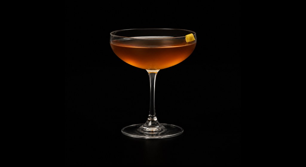 Hasty cocktail on a dark studio background