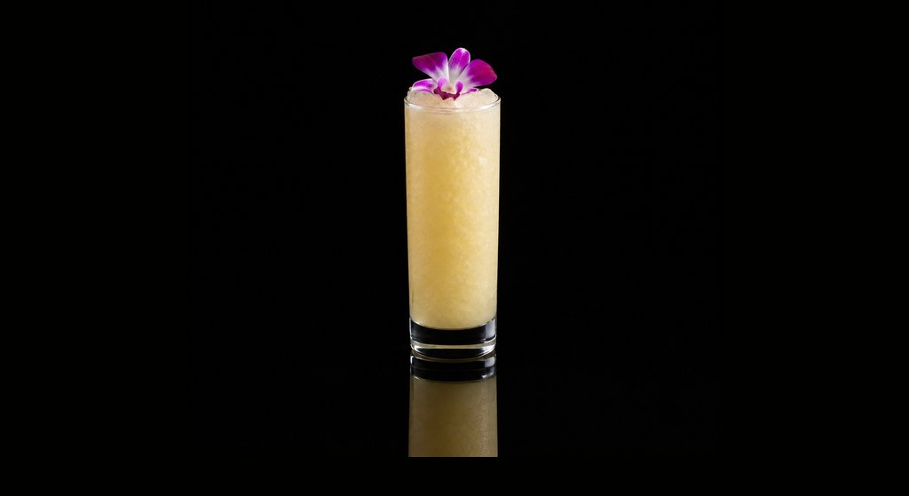 Hawaiian Eye cocktail on a dark studio background