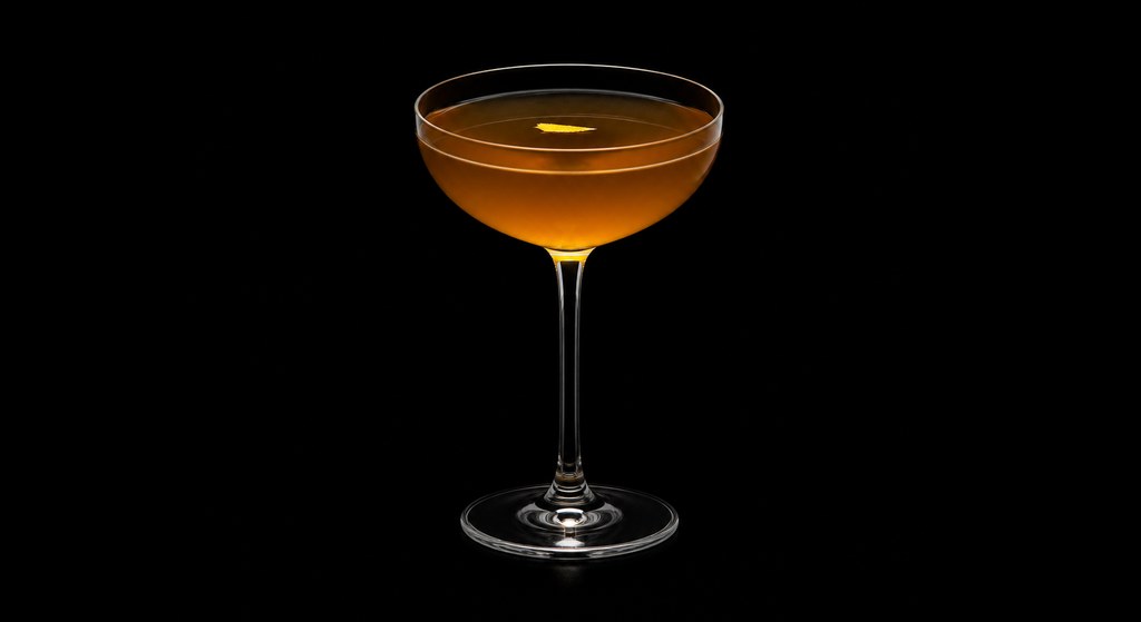 Heavenly Dram cocktail on a dark studio background