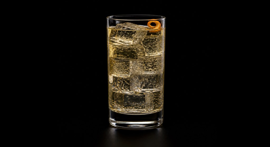 Highland Cooler cocktail on a dark studio background