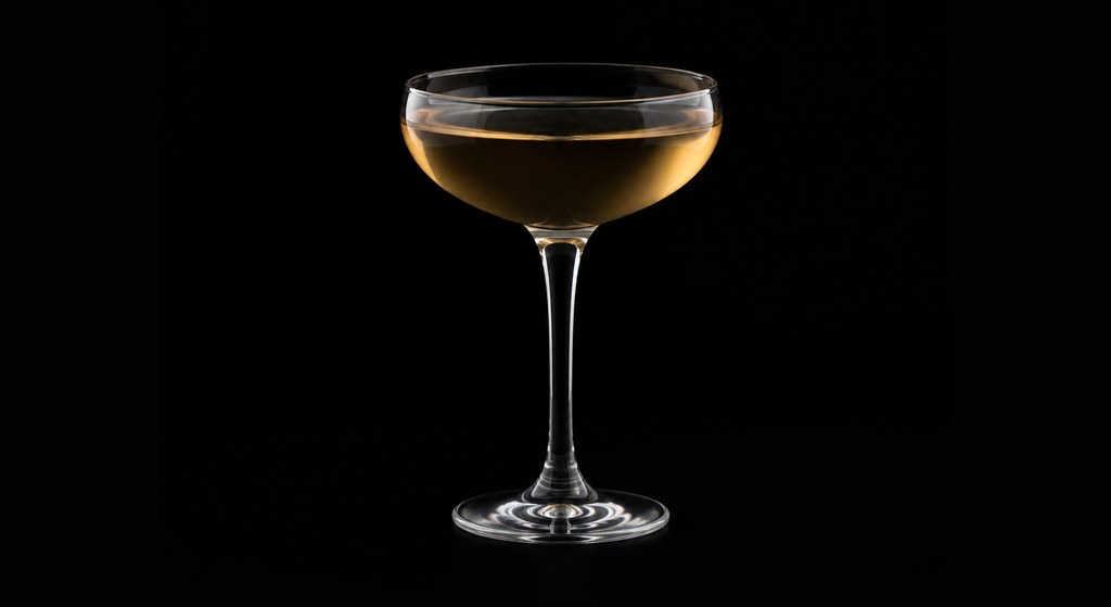 Hole-in-One Cocktail cocktail on a dark studio background