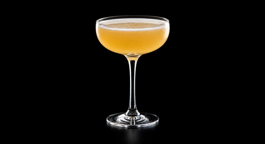 Holland House cocktail on a dark studio background