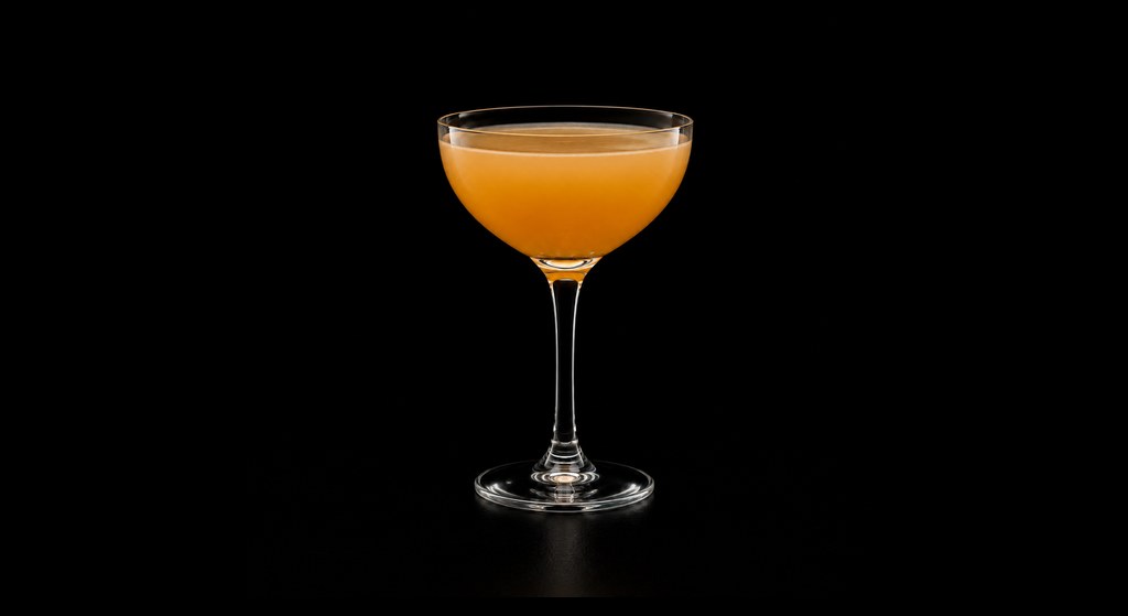 Honey & Marmalade Dram cocktail on a dark studio background
