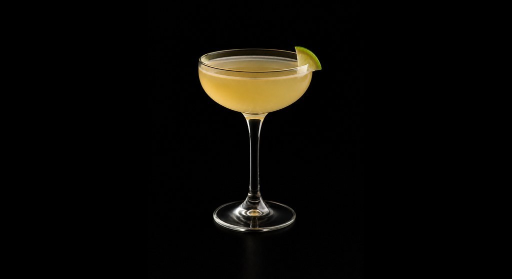 Honey Aperitif Daiquiri cocktail on a dark studio background