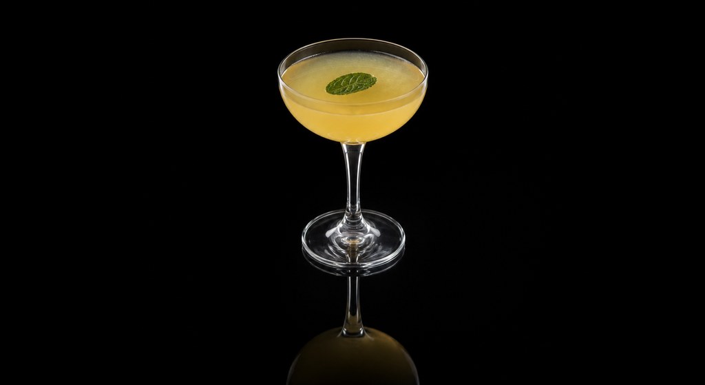 Honeysuckle Daiquiri cocktail on a dark studio background