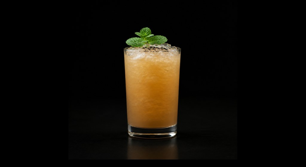 Horse With No Name cocktail on a dark studio background
