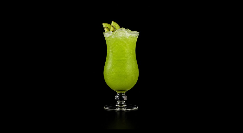 Iguanero cocktail on a dark studio background
