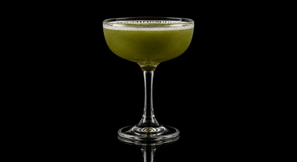 Industry Sour cocktail on a dark studio background