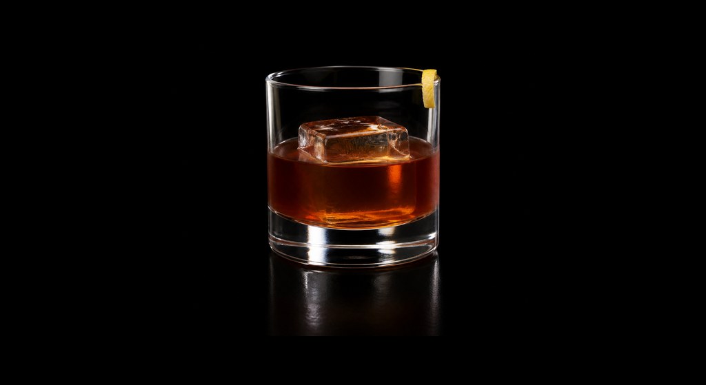 Iron Cross cocktail on a dark studio background