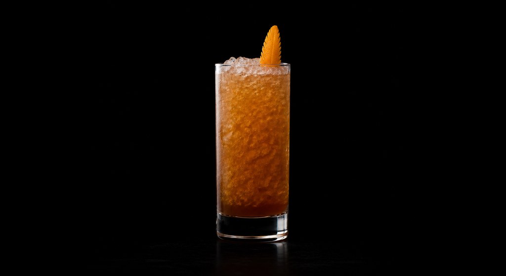 Iz Bananaz cocktail on a dark studio background