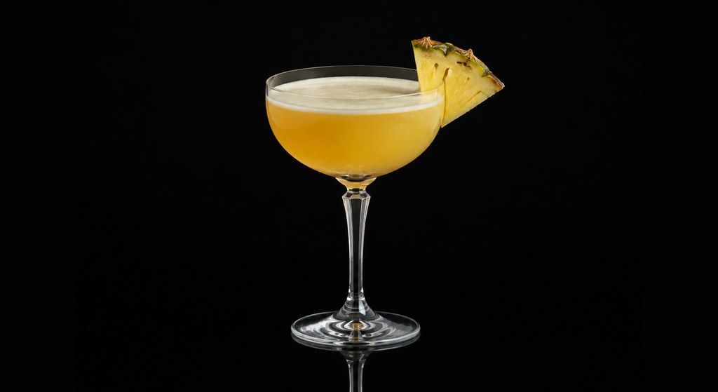 Jack-in-the-Box cocktail on a dark studio background