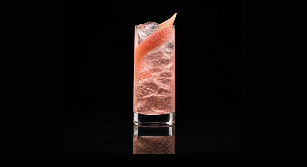Jessica Collins cocktail on a dark studio background
