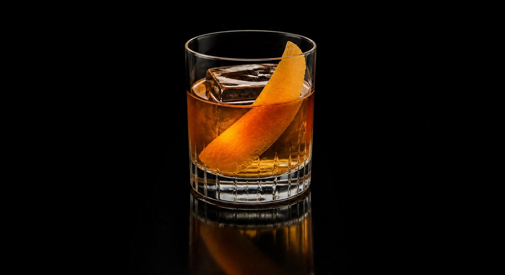 Joaquín Simós Old-Fashioned cocktail on a dark studio background