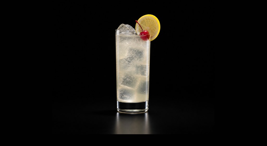 John Collins cocktail on a dark studio background