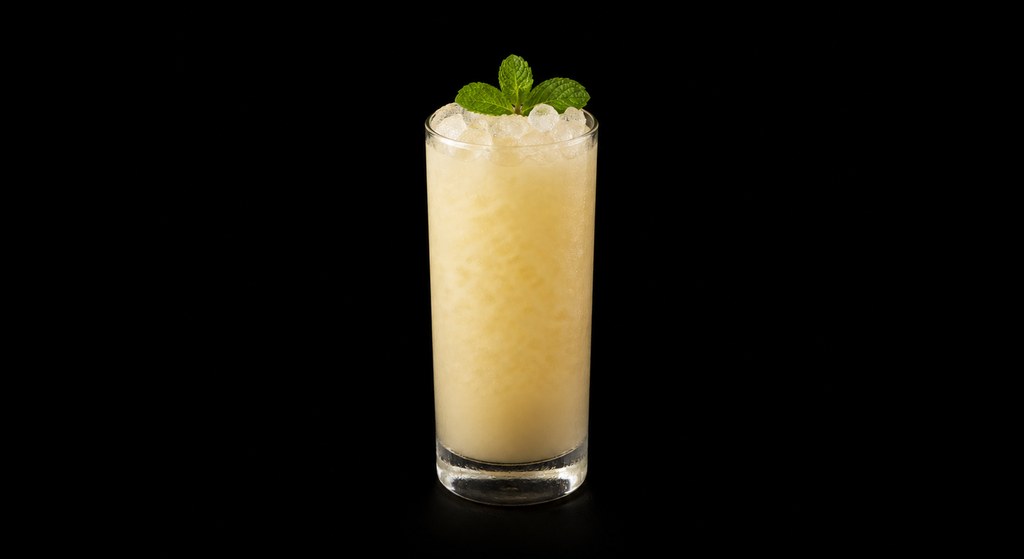 June n Juice cocktail on a dark studio background