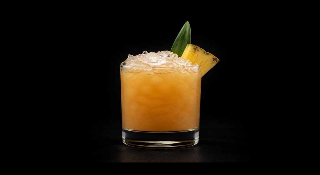 The Jungle Booby From The Polynesian cocktail on a dark studio background
