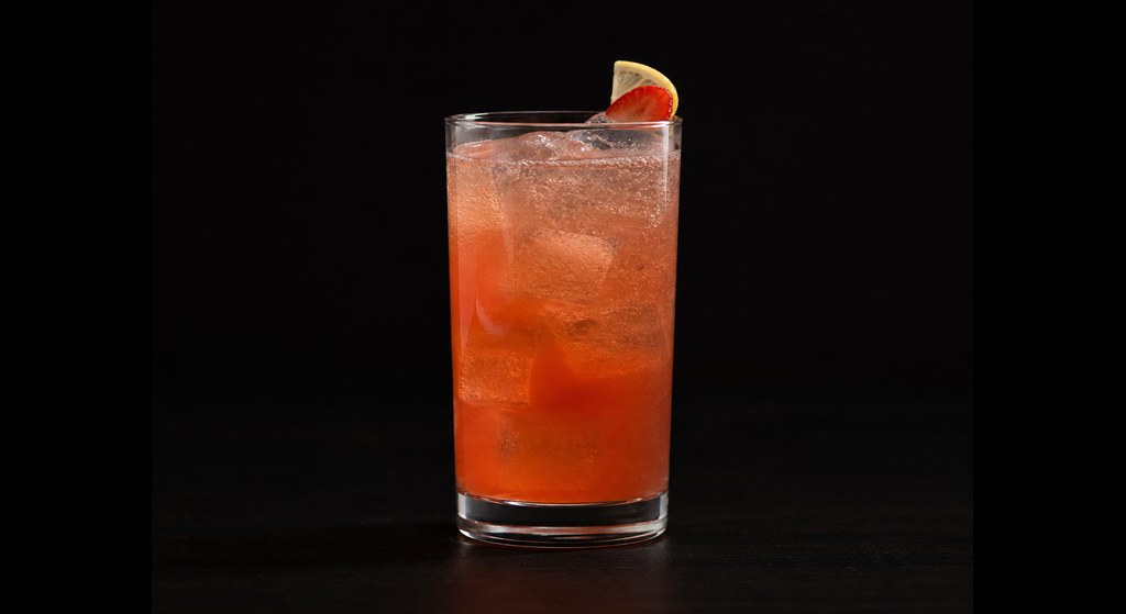 Kentucky Buck cocktail on a dark studio background