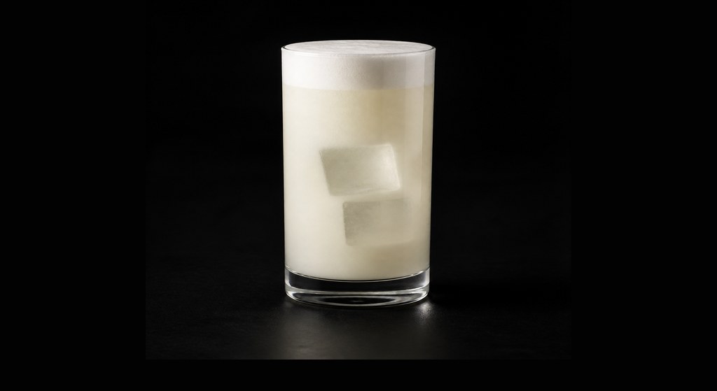 Lady Love Fizz cocktail on a dark studio background