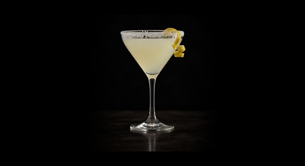 Lemon Drop cocktail on a dark studio background