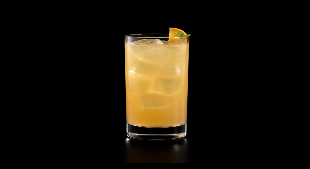 London Sour cocktail on a dark studio background