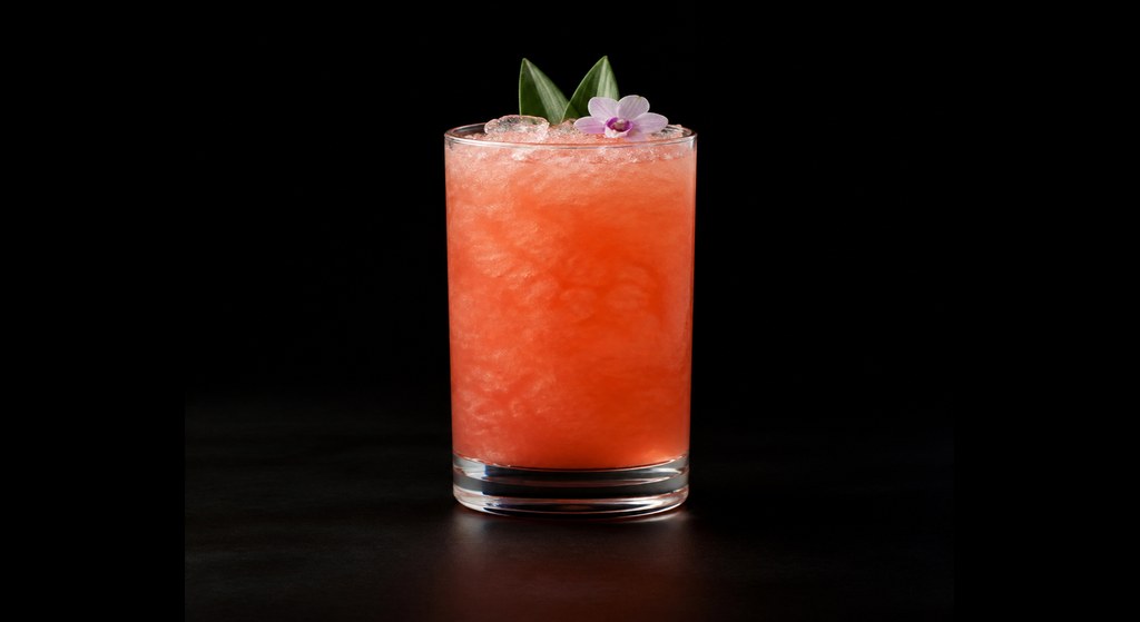 Lost Lake cocktail on a dark studio background