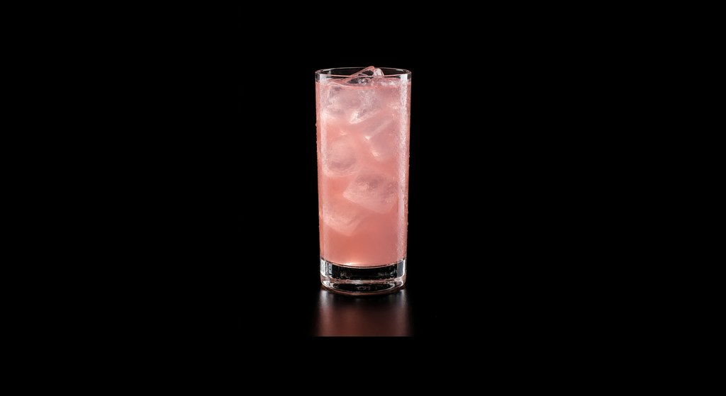Lychee Rose Mocktail cocktail on a dark studio background