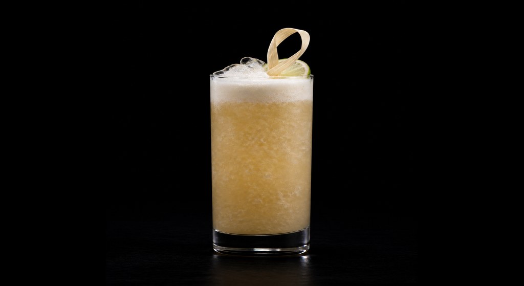 Mildred's Hole in One cocktail on a dark studio background