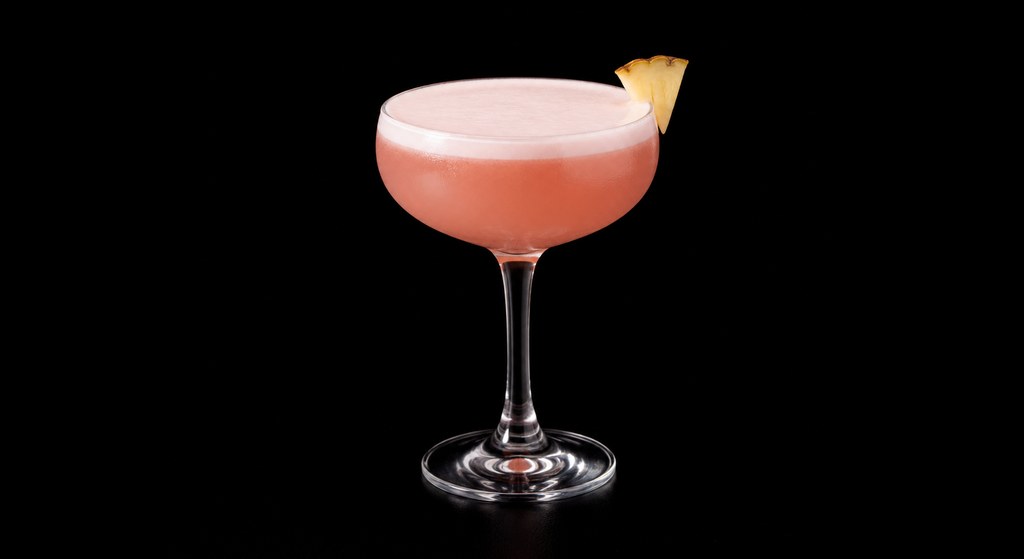 Million-Dollar Cocktail cocktail on a dark studio background