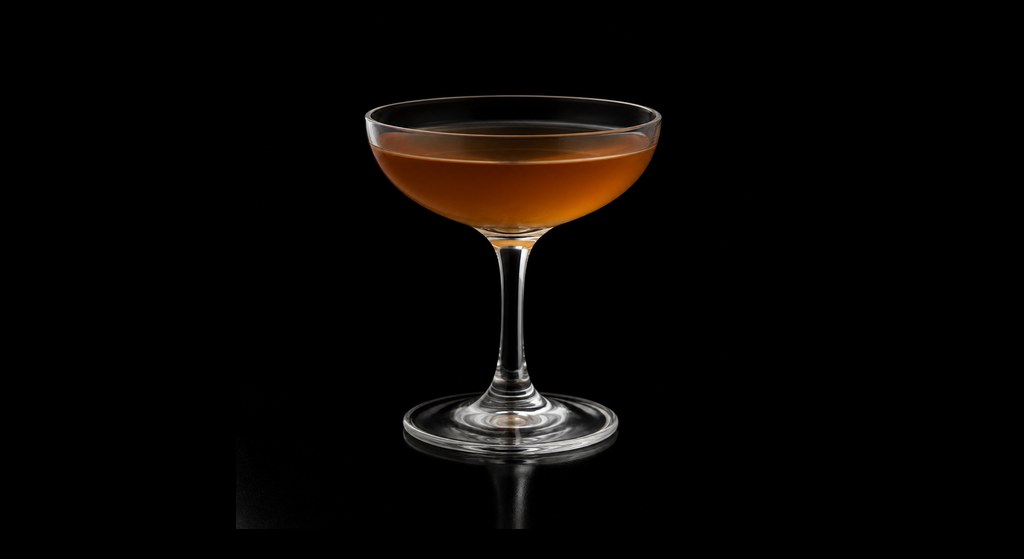 Minnie the Moocher cocktail on a dark studio background