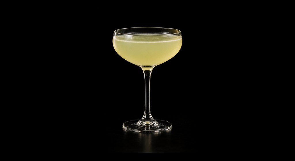 Monkey Loves Pandan cocktail on a dark studio background