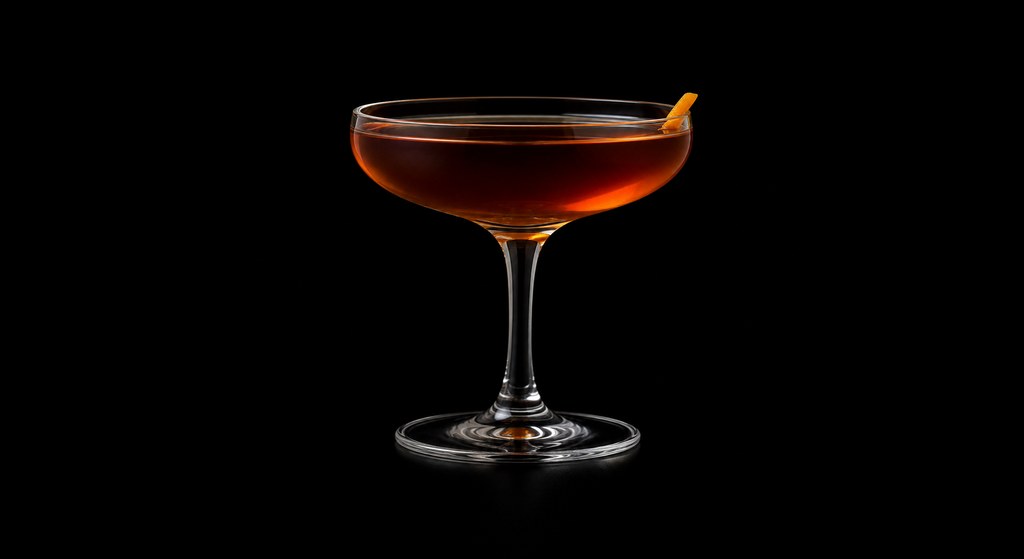 Nessie Cocktail cocktail on a dark studio background
